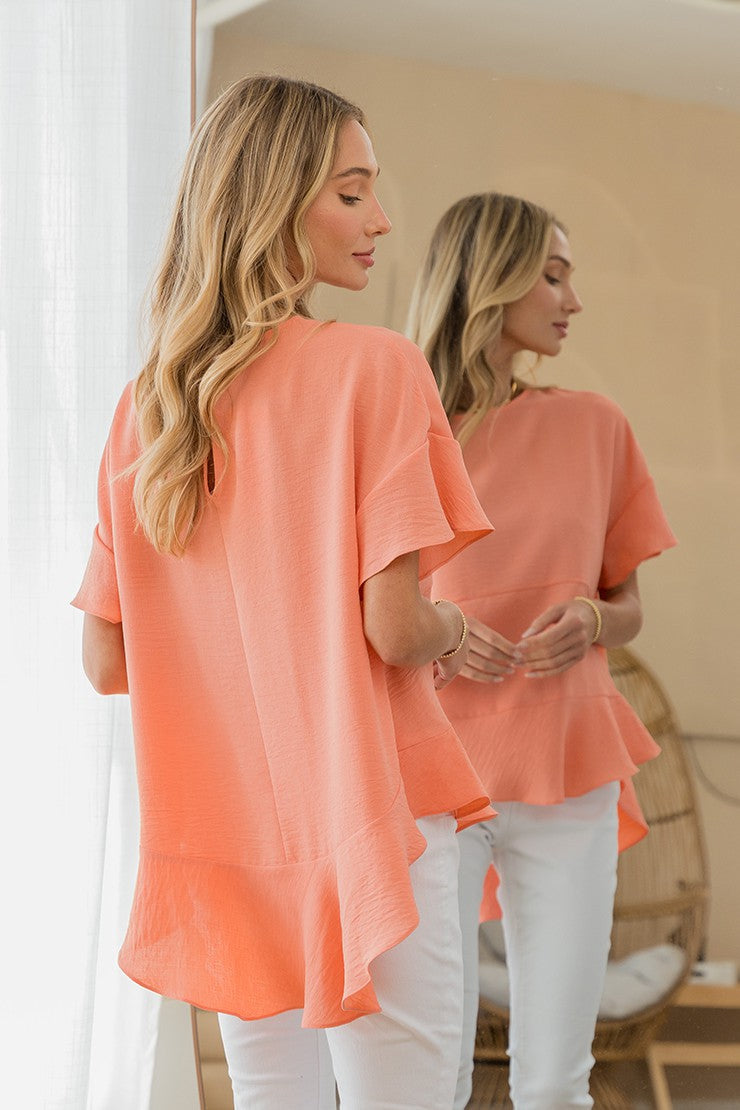 Coral Round Neck Ruffle Hem Top